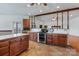 Kitchen featuring custom cabinets, granite countertops, stainless appliances and tile flooring at 1030 Hurley School Rd, Salisbury, NC 28147