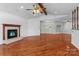Open living room with hardwood floors and fireplace, perfect for entertaining guests at 1030 Hurley School Rd, Salisbury, NC 28147