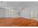 Open living room with hardwood floors and fireplace, perfect for entertaining guests at 1030 Hurley School Rd, Salisbury, NC 28147