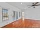 Bright living space featuring hardwood floors, ample natural light, and seamless indoor-outdoor flow at 1030 Hurley School Rd, Salisbury, NC 28147