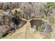 Aerial view showcasing two ponds surrounded by trees and natural landscaping in a peaceful setting at 1030 Hurley School Rd, Salisbury, NC 28147