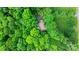 Stunning aerial view of a home nestled in lush, green surroundings at 1080 Rolling Green Dr, Newton, NC 28658