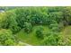 Aerial view of large grassy and wooded property at 1080 Rolling Green Dr, Newton, NC 28658