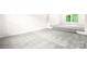 Bright living room featuring plush carpet and a two-step elevation change at 1080 Rolling Green Dr, Newton, NC 28658