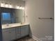 Well-lit bathroom featuring double sinks and plenty of counter space at 111 High Rock Ct # 10, Statesville, NC 28677
