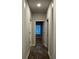 Hallway with wood floors and white trim at 111 High Rock Ct # 10, Statesville, NC 28677