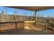 View from spacious outdoor deck with wood railing, perfect for outdoor living at 121 High Rock Ct # 08, Statesville, NC 28677