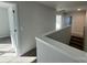 Hallway with carpet flooring, natural light and neutral paint at 121 High Rock Ct # 08, Statesville, NC 28677