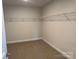 Spacious walk-in closet with wire shelving for ample storage at 121 High Rock Ct # 08, Statesville, NC 28677