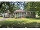 Charming single-story brick home with a covered carport and well-maintained front yard at 1327 Crestview Dr, Shelby, NC 28150