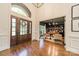 Beautiful entryway with hardwood floors and views of the office and living spaces at 13358 Bally Bunnion Way, Davidson, NC 28036