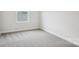 Bedroom featuring new carpet floors and a bright window view at 150 Aberdeen Dr, Salisbury, NC 28144