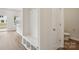 Bright hallway features built-in bench with storage and easy access to a half bathroom at 150 Aberdeen Dr, Salisbury, NC 28144