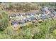 Community aerial view featuring manicured lawns and tree-lined streets in a well-planned neighborhood at 152 Broadleaf Dr, Denver, NC 28037