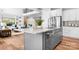 Kitchen island with granite countertops and stainless steel appliances in an open-concept layout at 152 Broadleaf Dr, Denver, NC 28037