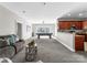 Spacious finished basement with a pool table and a kitchenette perfect for entertaining at 16455 Harbor View Rd, Charlotte, NC 28278