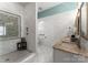 Modern bathroom featuring a walk-in shower, tile walls, and granite vanity at 16455 Harbor View Rd, Charlotte, NC 28278