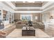 Bright and airy living space with a large window, built-in shelving, and a view of the outdoors at 16455 Harbor View Rd, Charlotte, NC 28278