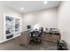 Bright office space with custom built-ins, desk, and a cozy chair for productive work at 16455 Harbor View Rd, Charlotte, NC 28278