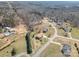 Aerial view of property, highlighting neighborhood and mature trees at 1922 Dogwood Flower Ln, Lincolnton, NC 28092