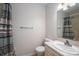 Standard bathroom featuring a shower and tub combo, sink, and toilet at 1922 Dogwood Flower Ln, Lincolnton, NC 28092
