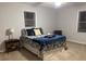 Comfortable bedroom with natural light, carpet floors, and a ceiling fan at 1922 Dogwood Flower Ln, Lincolnton, NC 28092