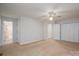 Spacious bedroom featuring neutral walls, carpeted floors, and a ceiling fan for added comfort at 1922 Dogwood Flower Ln, Lincolnton, NC 28092