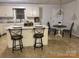 Bright kitchen with a center island, breakfast nook, and eat-in dining space at 1922 Dogwood Flower Ln, Lincolnton, NC 28092
