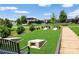 Community amenity center featuring a cornhole, benches, and manicured landscaping at 23128 Goose Down Ln, Lancaster, SC 29720