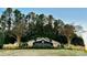 A stone Edgewater community sign nestled within a beautifully landscaped entrance and featuring holiday wreaths at 23128 Goose Down Ln, Lancaster, SC 29720