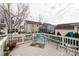 Large wooden deck with outdoor seating and views of surrounding neighborhood at 23128 Goose Down Ln, Lancaster, SC 29720