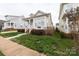 Inviting home with a covered porch, white railings, and landscaped front yard at 23128 Goose Down Ln, Lancaster, SC 29720