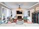 Inviting living room featuring a fireplace, neutral furniture, and decor at 23128 Goose Down Ln, Lancaster, SC 29720