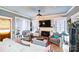 Inviting living room featuring a fireplace, neutral furniture, and decor at 23128 Goose Down Ln, Lancaster, SC 29720