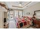Tranquil main bedroom boasting natural light, tray ceiling and decor at 23128 Goose Down Ln, Lancaster, SC 29720