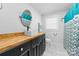 Stylish bathroom featuring modern vanity, new fixtures, and patterned shower curtain at 2318 Knight Dr, Gastonia, NC 28052