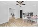 Spacious bedroom features wood-look flooring, a gaming desk and mirrored closet at 2318 Knight Dr, Gastonia, NC 28052