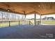 Large covered outdoor living space with ceiling fans and scenic views at 2321 Ivey Church Rd, Maiden, NC 28650