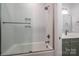 Bathroom showcasing tub/shower combo, sleek vanity, and natural light at 2321 Ivey Church Rd, Maiden, NC 28650
