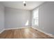 Bright bedroom features natural light, ceiling fan, beautiful wood floors and fresh paint at 2321 Ivey Church Rd, Maiden, NC 28650