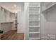 Spacious walk-in closet with ample shelving and storage for organization and convenience at 2321 Ivey Church Rd, Maiden, NC 28650