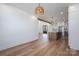 Open concept living room and kitchen features a center island, stainless appliances, and wood floors at 2321 Ivey Church Rd, Maiden, NC 28650