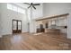 Bright and airy living room with high ceilings, wood beams, a fireplace, and an open concept kitchen for Gathering gatherings at 2321 Ivey Church Rd, Maiden, NC 28650