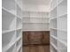 Large walk-in pantry has abundant shelving for easy storage of groceries and essentials at 2321 Ivey Church Rd, Maiden, NC 28650