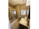Cozy bathroom with a shower-tub combo and neutral mosaic tile at 300 Mcalway Rd, Charlotte, NC 28211