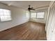 Bright bedroom featuring hardwood floors, two windows and ample closet space at 300 Mcalway Rd, Charlotte, NC 28211