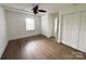 Spacious bedroom featuring hardwood floors, natural light and multiple closets at 300 Mcalway Rd, Charlotte, NC 28211