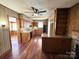 Well-lit kitchen with wooden cabinets, granite counters, and an island at 300 Mcalway Rd, Charlotte, NC 28211