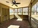 Relaxing screened porch with brick flooring and ample natural light at 300 Mcalway Rd, Charlotte, NC 28211