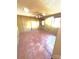 A brightly lit, neutral bonus room with tile floors, a ceiling fan, and an exterior door at 300 Mcalway Rd, Charlotte, NC 28211